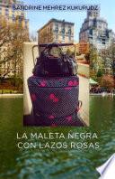 La maleta negra con lazos rosas