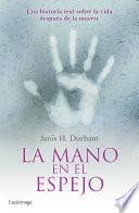 La mano en el espejo